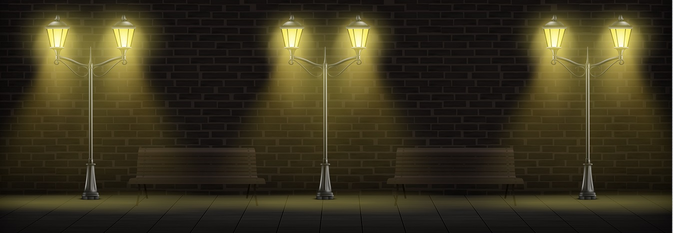 Streetlights lighting on brick wall background